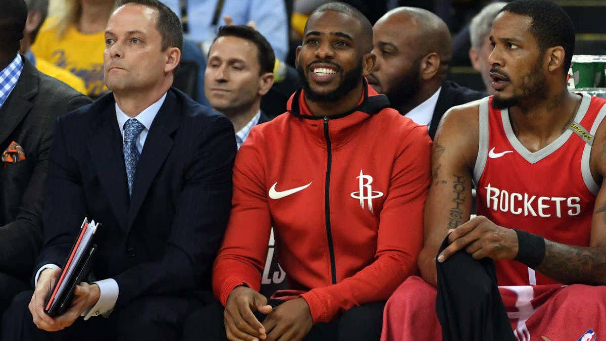 Injured point guard Chris Paul views Game 6 of the Western Conference Finals in exclusive Rockets-themed Air Jordan 10s.