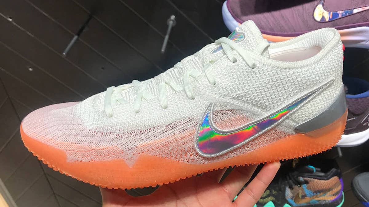 Early images of a new Nike Kobe A.D. NXT 360 colorway in white/orange/purple. 