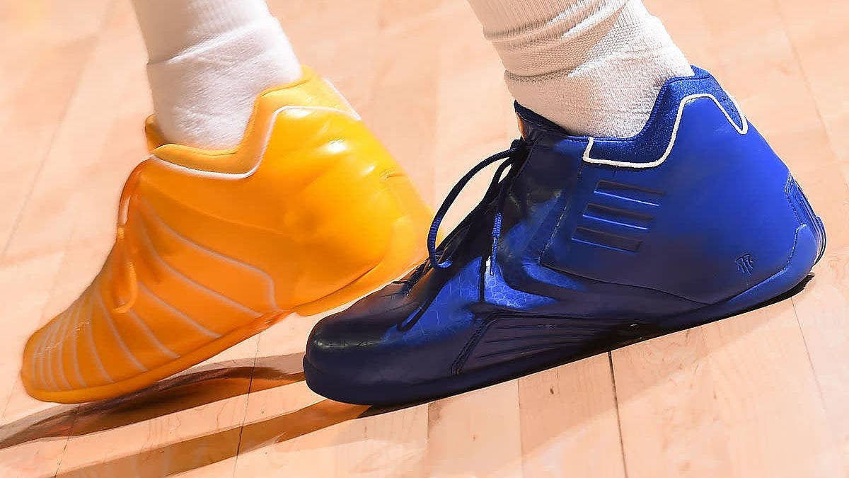 Inspired by Tracy McGrady's sneakers in the 2004 All-Star Game, Nick Young wears mismatched Adidas TMac 3s.