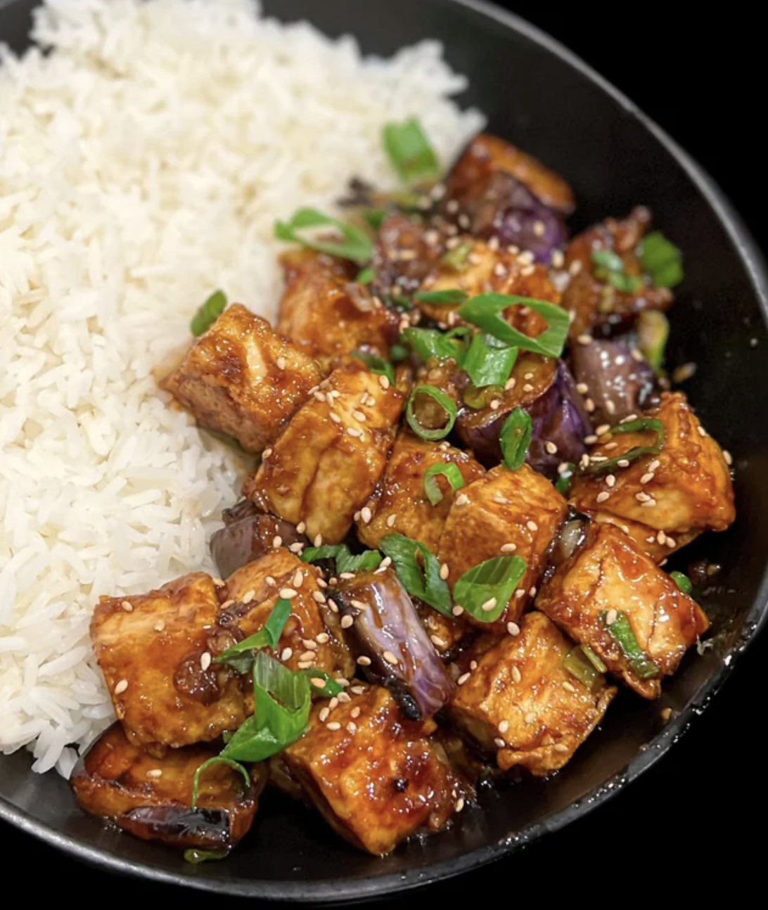 bowl of rice with tofu and eggplant