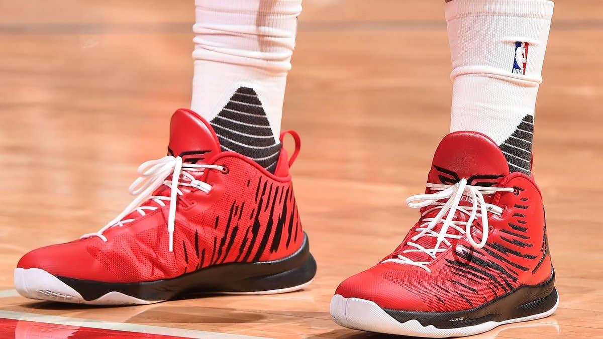 Blake Griffin makes young fan's dream come true by playing in the custom Jordans he designed.