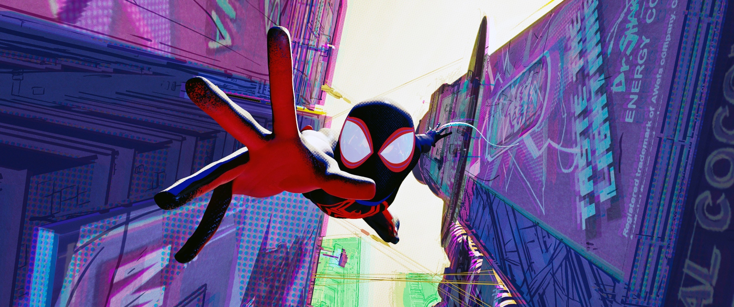 Spider-Man swinging through the streets in Spider-Man: Into the Spider-Verse