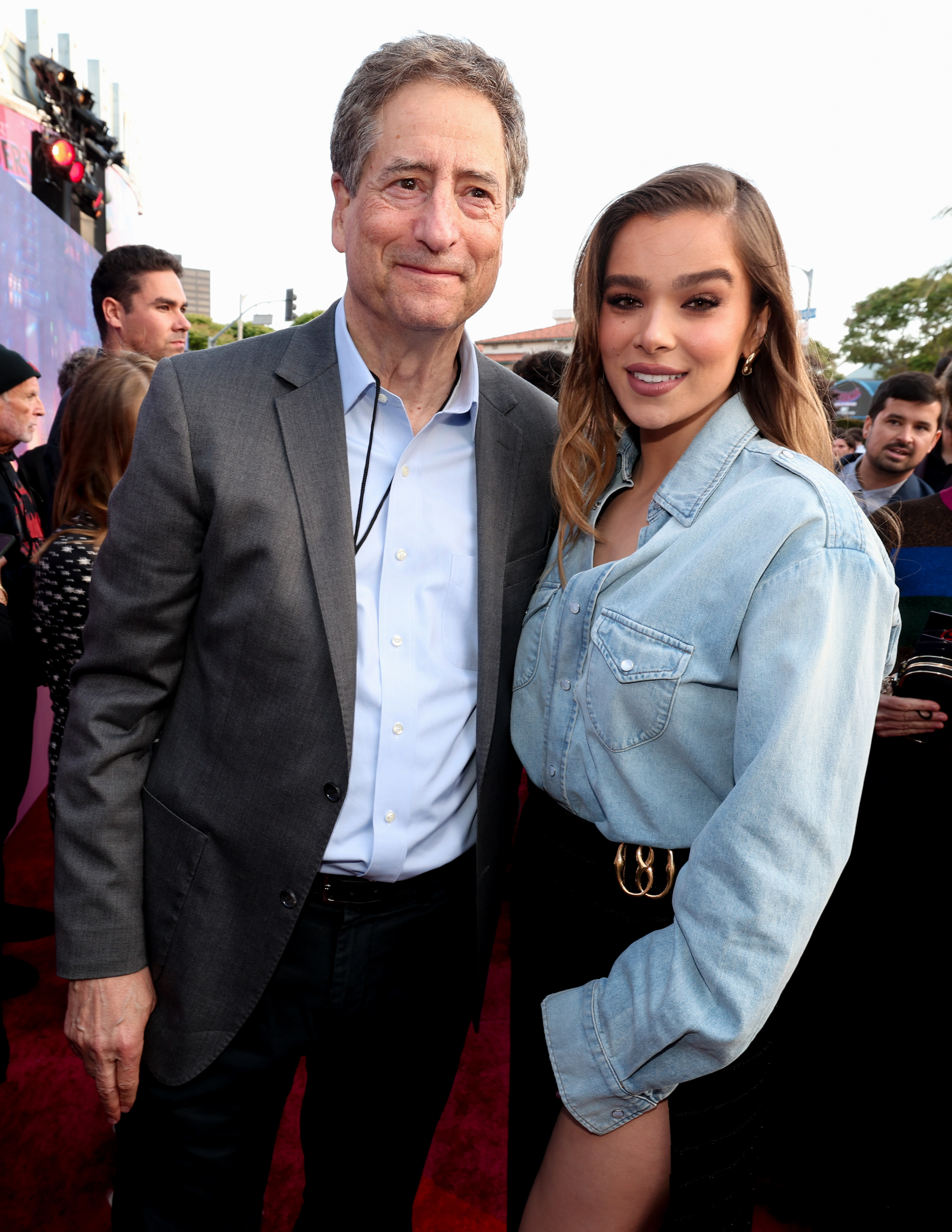 Tom Rothman poses for a picture with Hailee Steinfeld