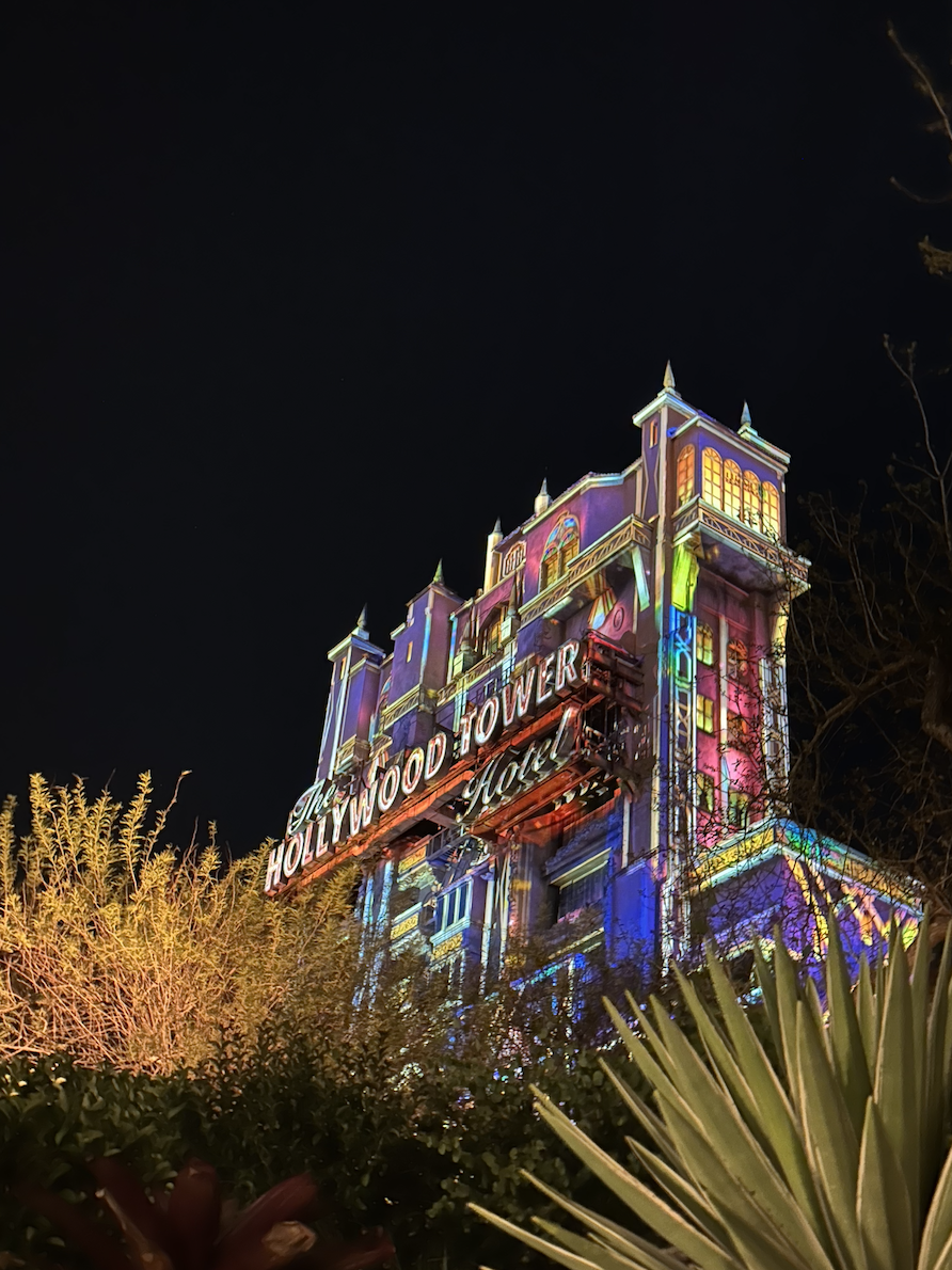 The Hollywood Tower Hotel all lit up at night
