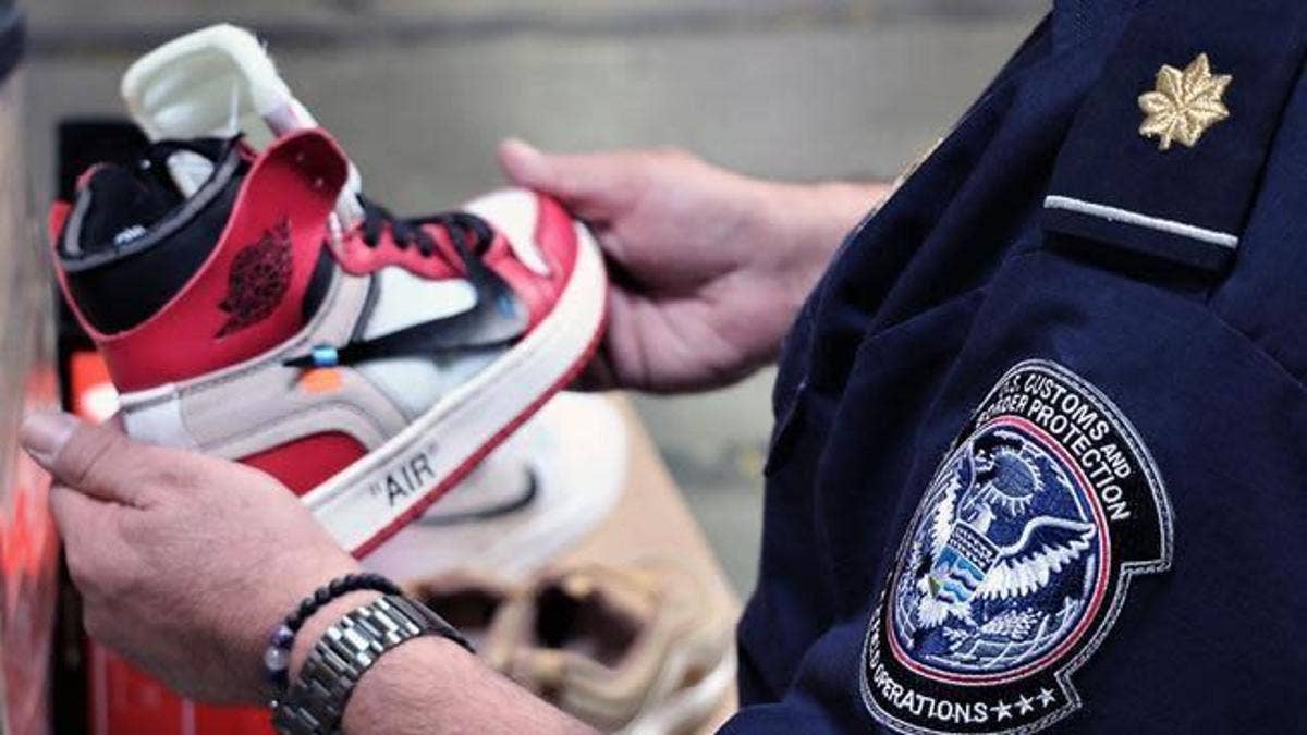 Border Protection seized nearly 15,000 fake sneakers at the Port of Los Angeles after examining mysterious containers from China.