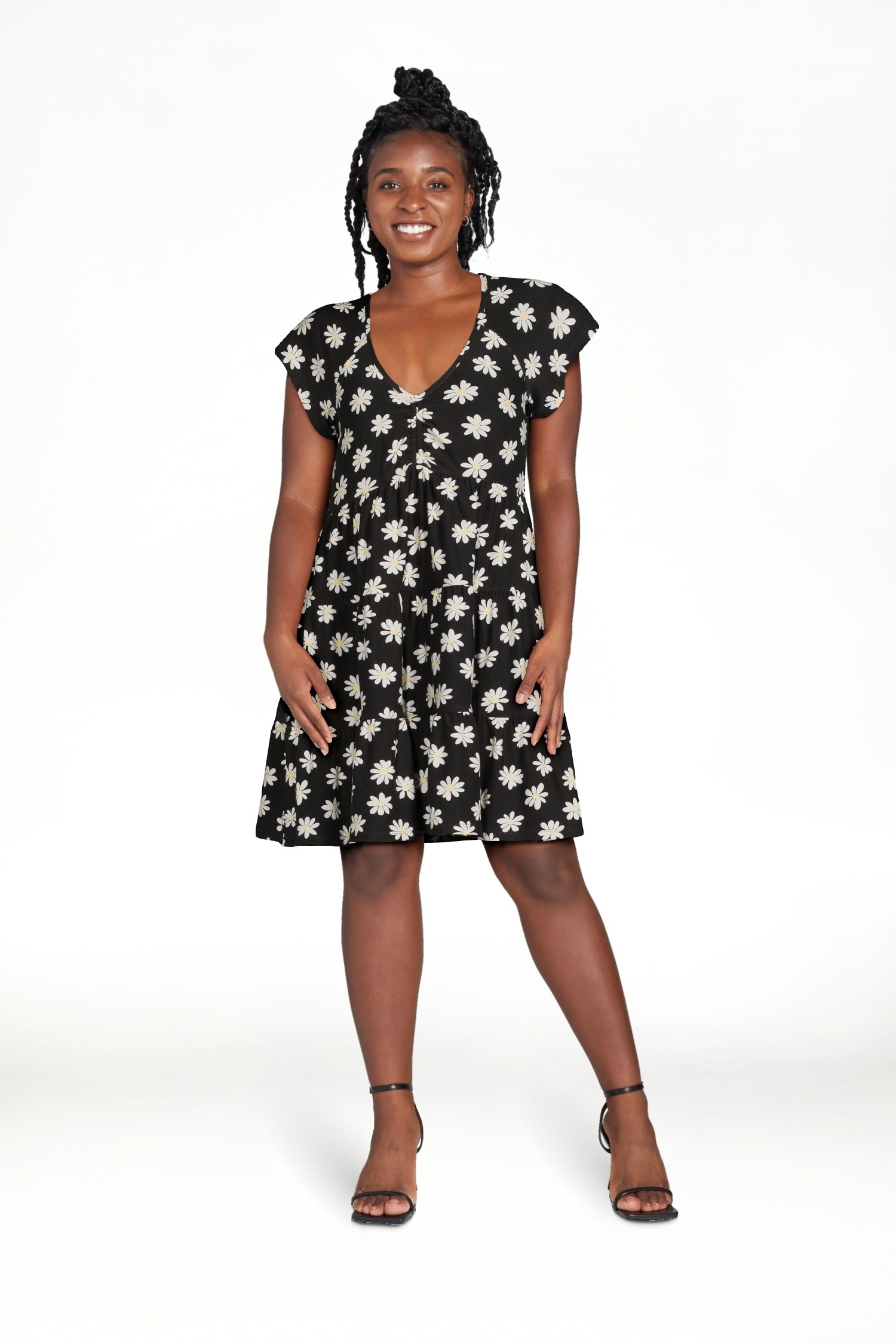 Model wearing the black soot floral dress