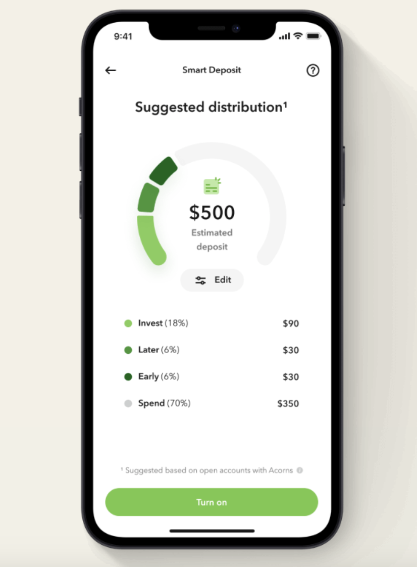a phone showing the breakdown of an estimated deposit split up by investments, later, early, and spend
