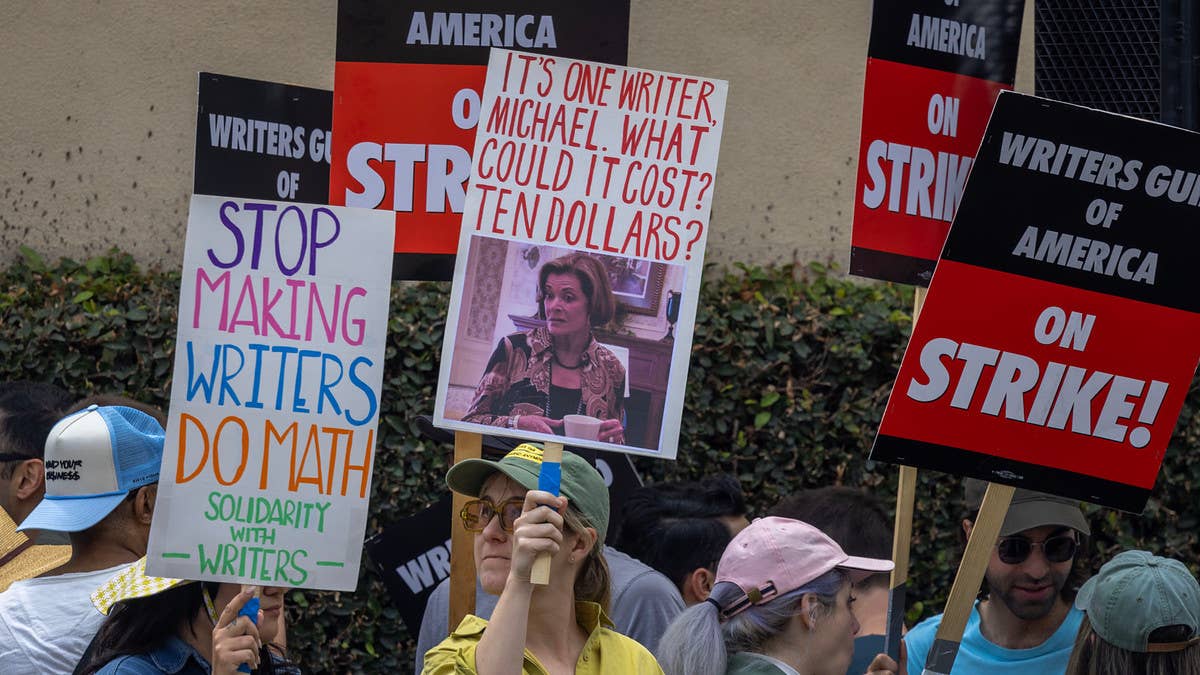 As the WGA strike continues, striking writers have been flexing their repeatedly proven creativity with hilarious and inspiring picket line signs.