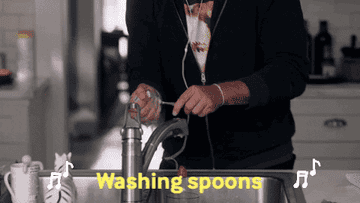 Man singing &quot;Washing spoons, washing the dishes!&quot;