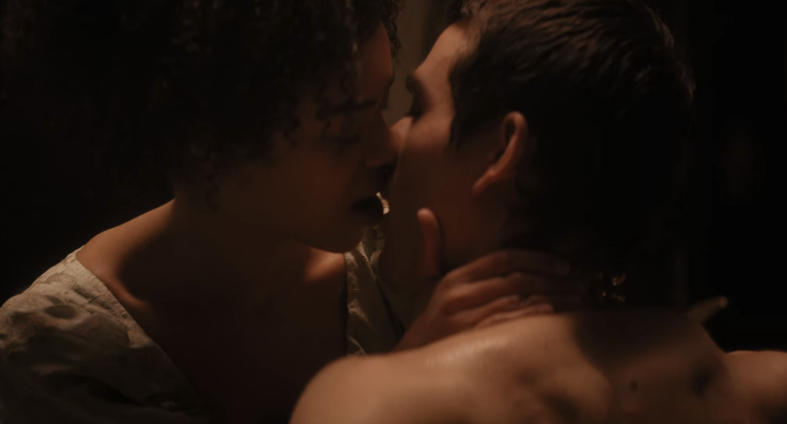two of the characters kissing