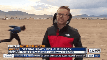 kid runs Naruto-style behind a reporter toward Area 51