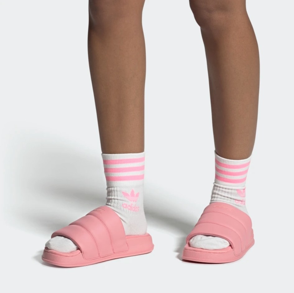 A pair of pink puffy slides