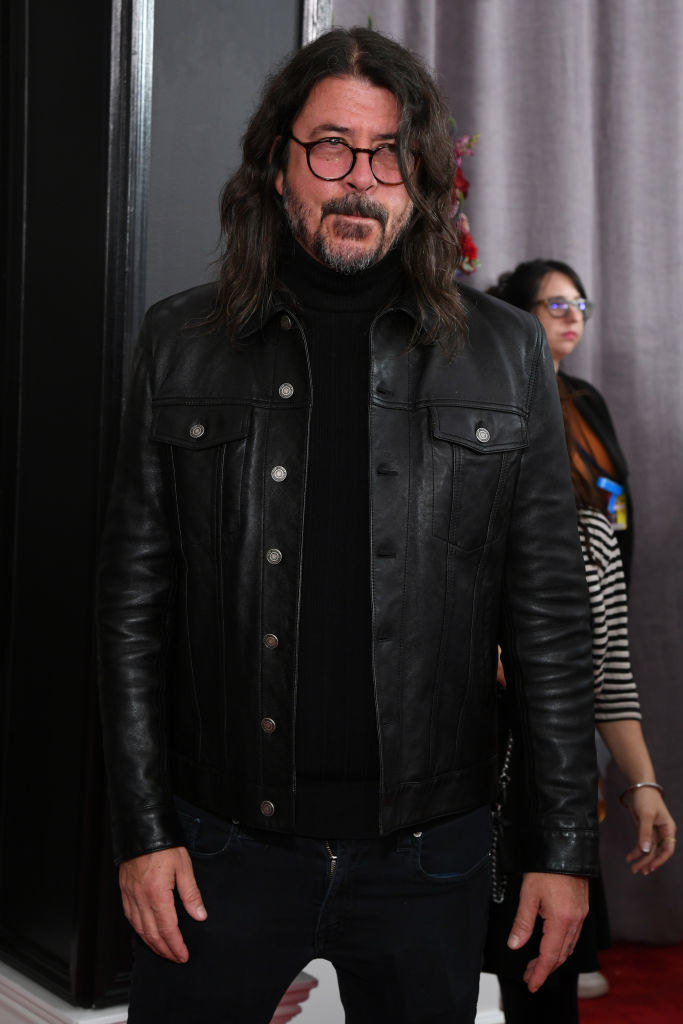 Dave in a leather jacket and jeans