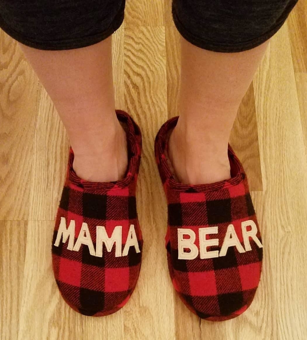 Image of reviewer wearing red plaid slippers
