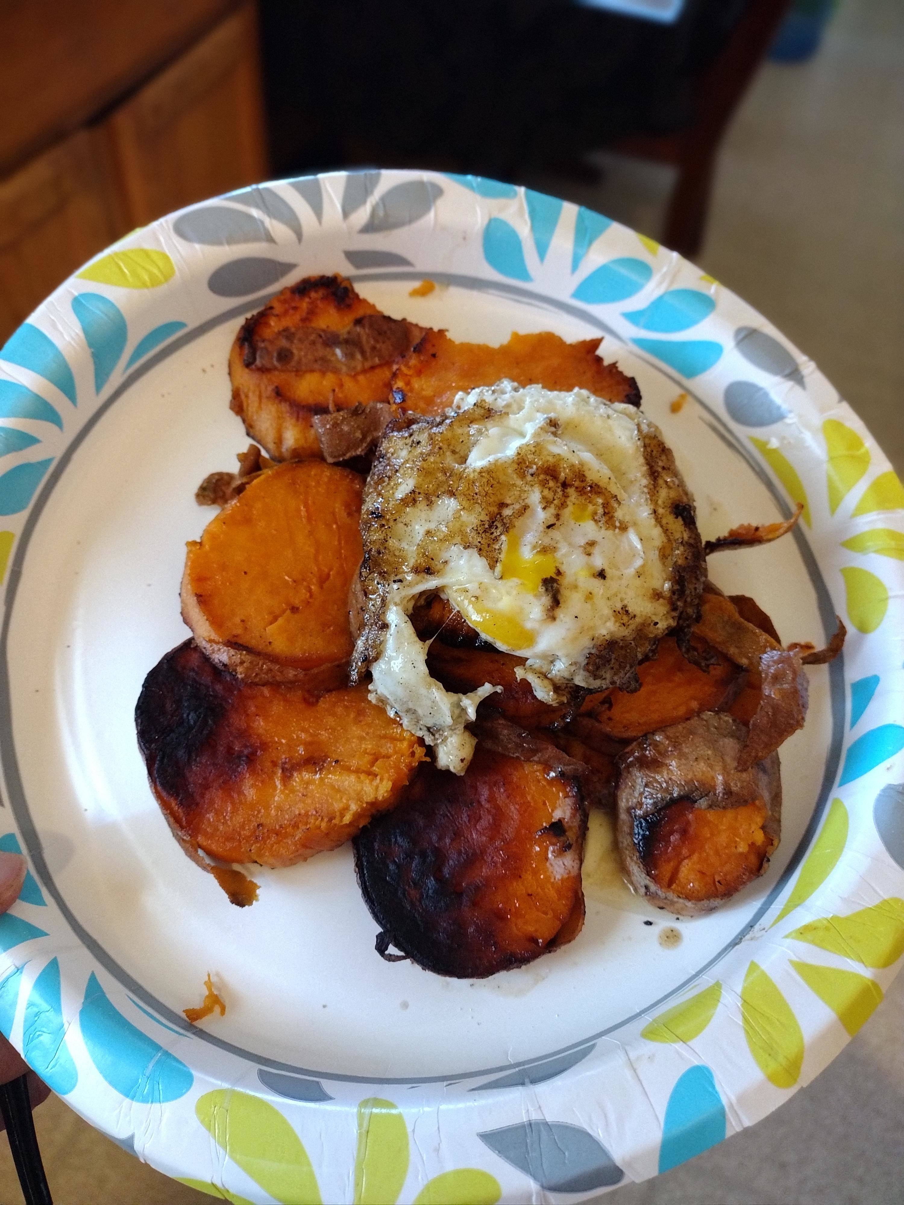 Sweet potato chunks with fried egg on top.