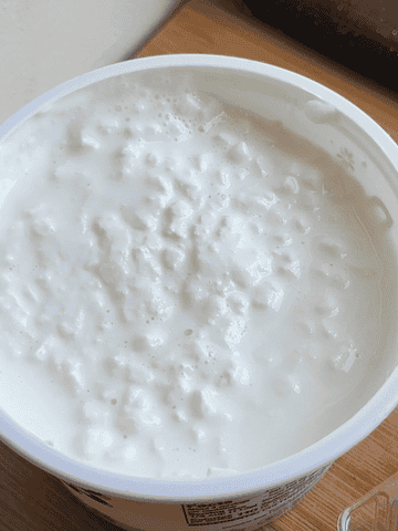 GIF of zooming in on cottage cheese