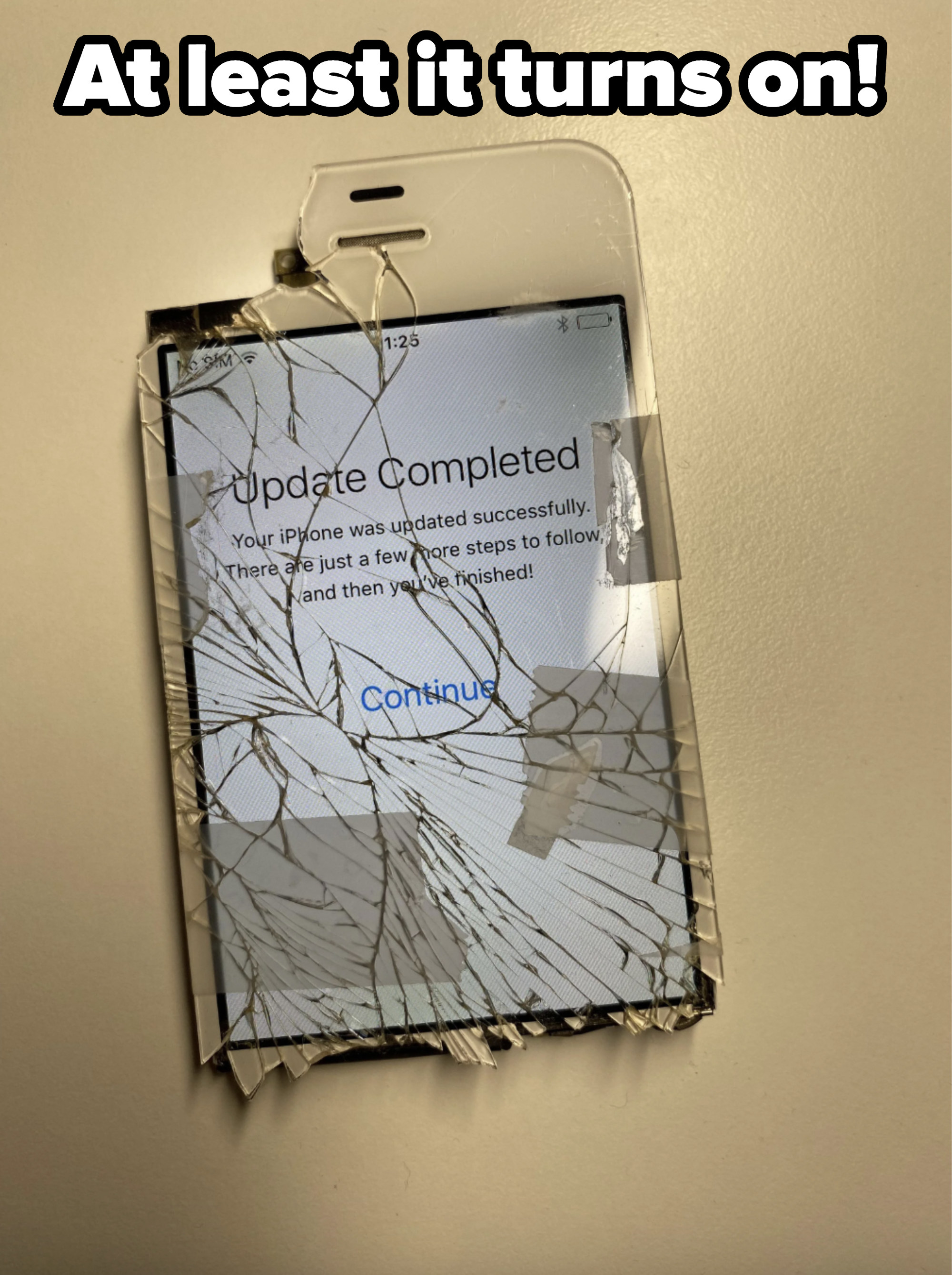 A severely cracked iPhone