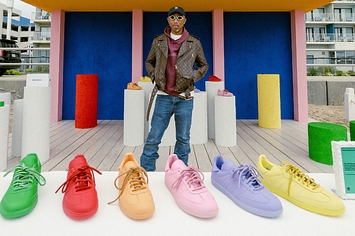 Pharrell posing with his new Samba collection at Adidas' Something in the Water pop-up.