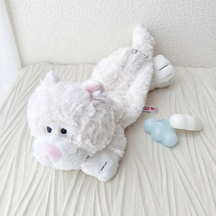 PLAZA（プラザ）のおすすめグッズ「ニキ NICI フィギュアポーチ シロネコ」