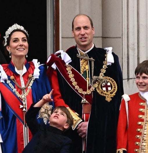 Prince Louis pointing and looking up