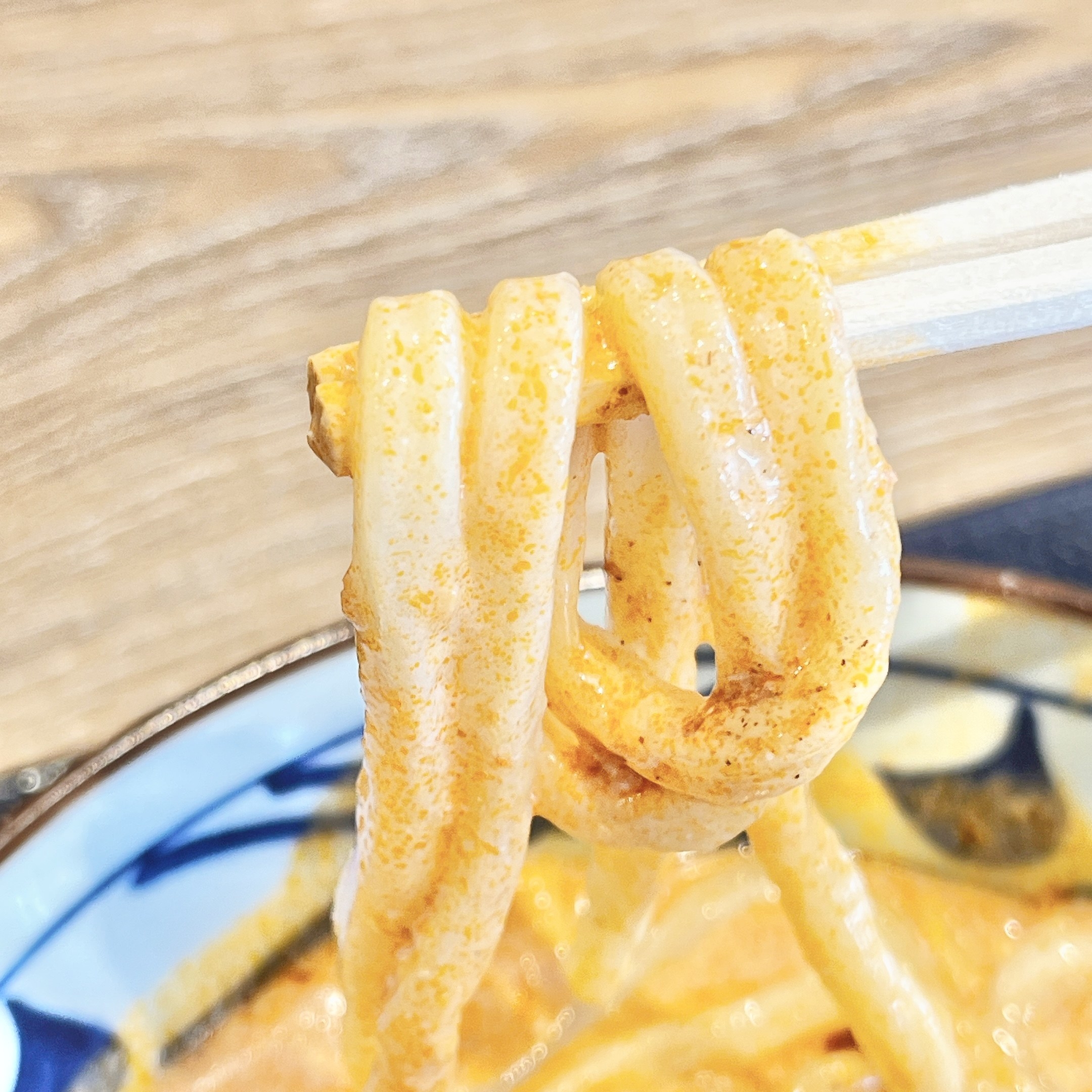 丸亀製麺のおすすめのうどん「豆乳仕立ての冷やしトマたまカレーうどん ひと口ごはんつき」