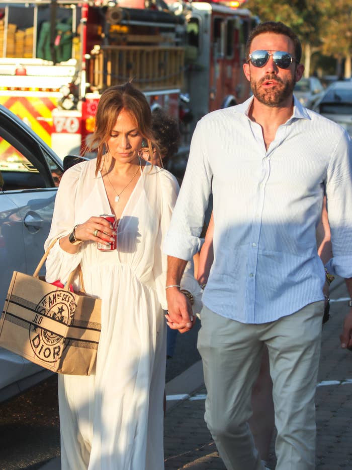 Jennifer Lopez and Ben Affleck holding hands