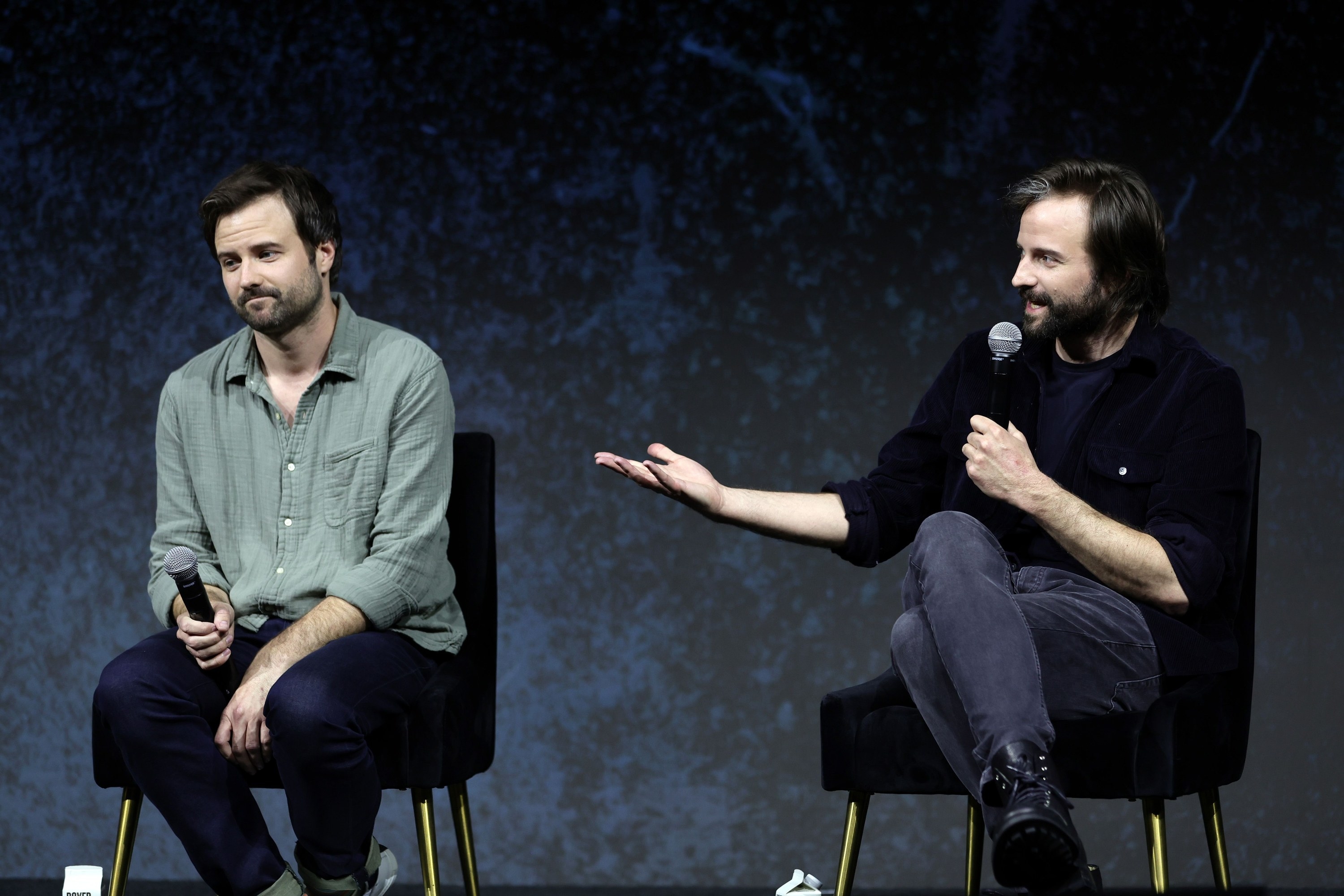 The Duffer brothers onstage during a panel