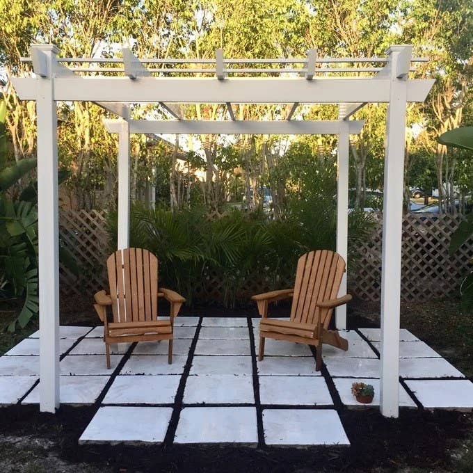 A reviewer photo of the pergola in a backyard