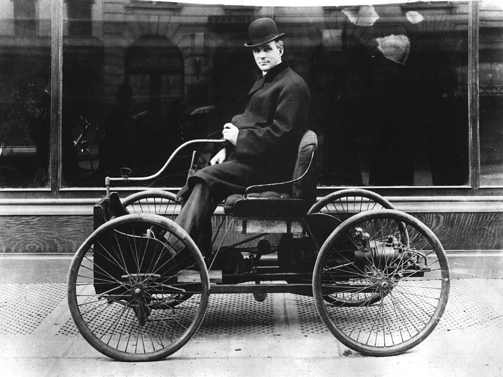 Henry Ford riding a quadricycle
