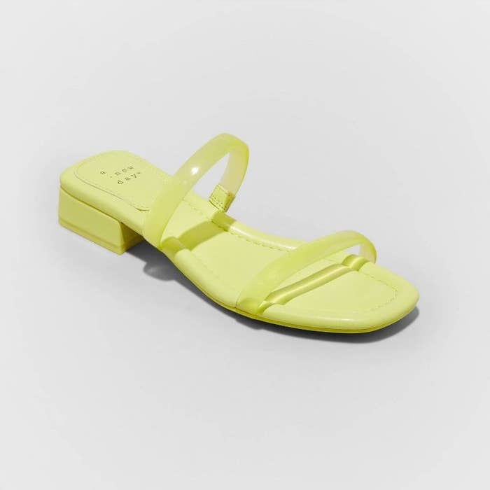 A pair of lime green sandals