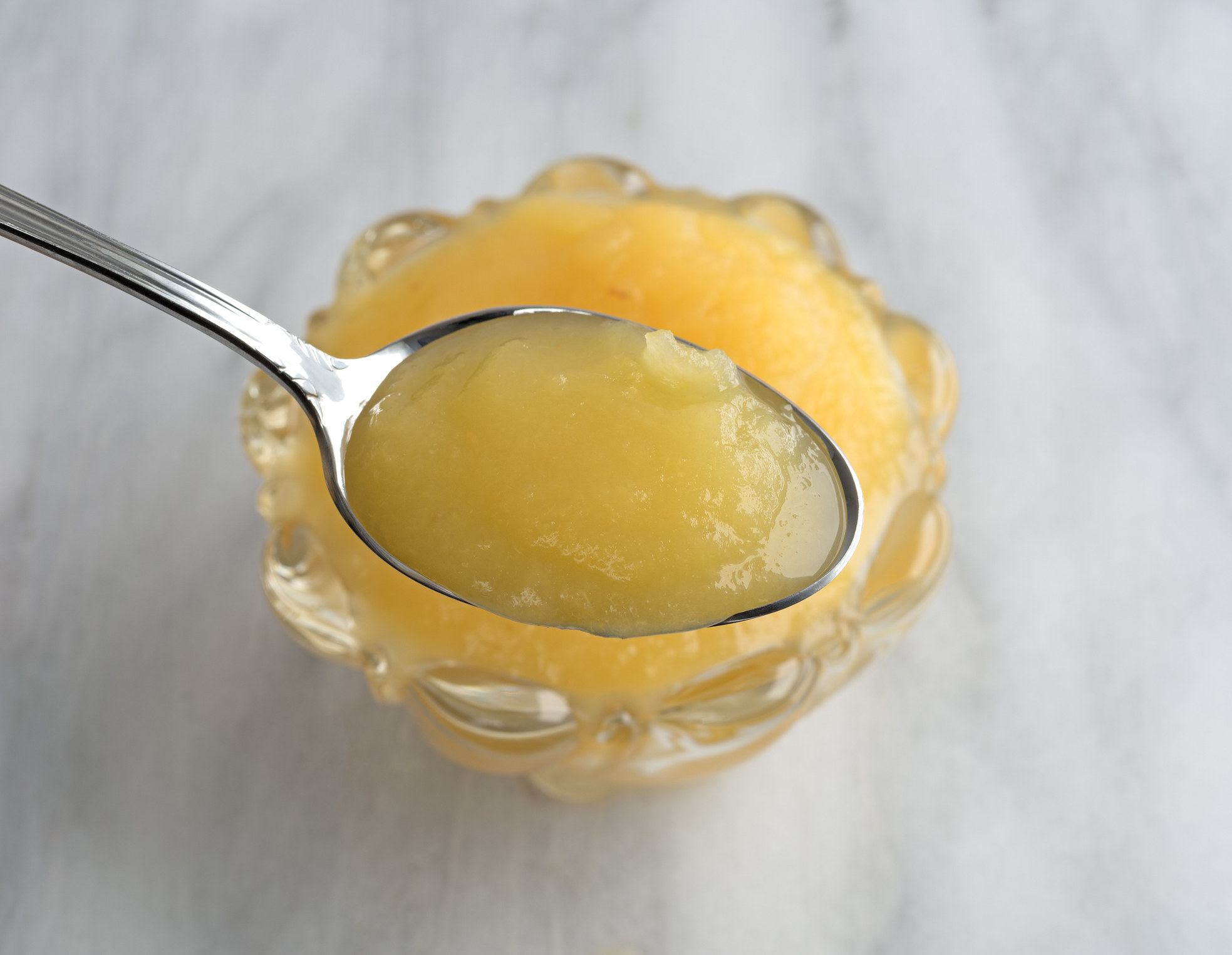 A spoonful of apple sauce.