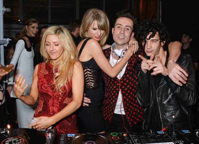 Ellie Goulding, Taylor Swift, Nick Grimshaw, and Matty Healy at a DJ tturntable