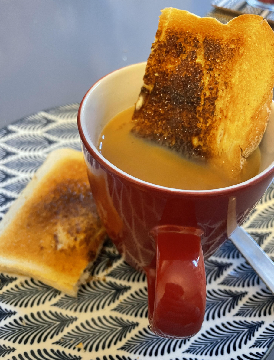 Buttered toast and a mug of tea.