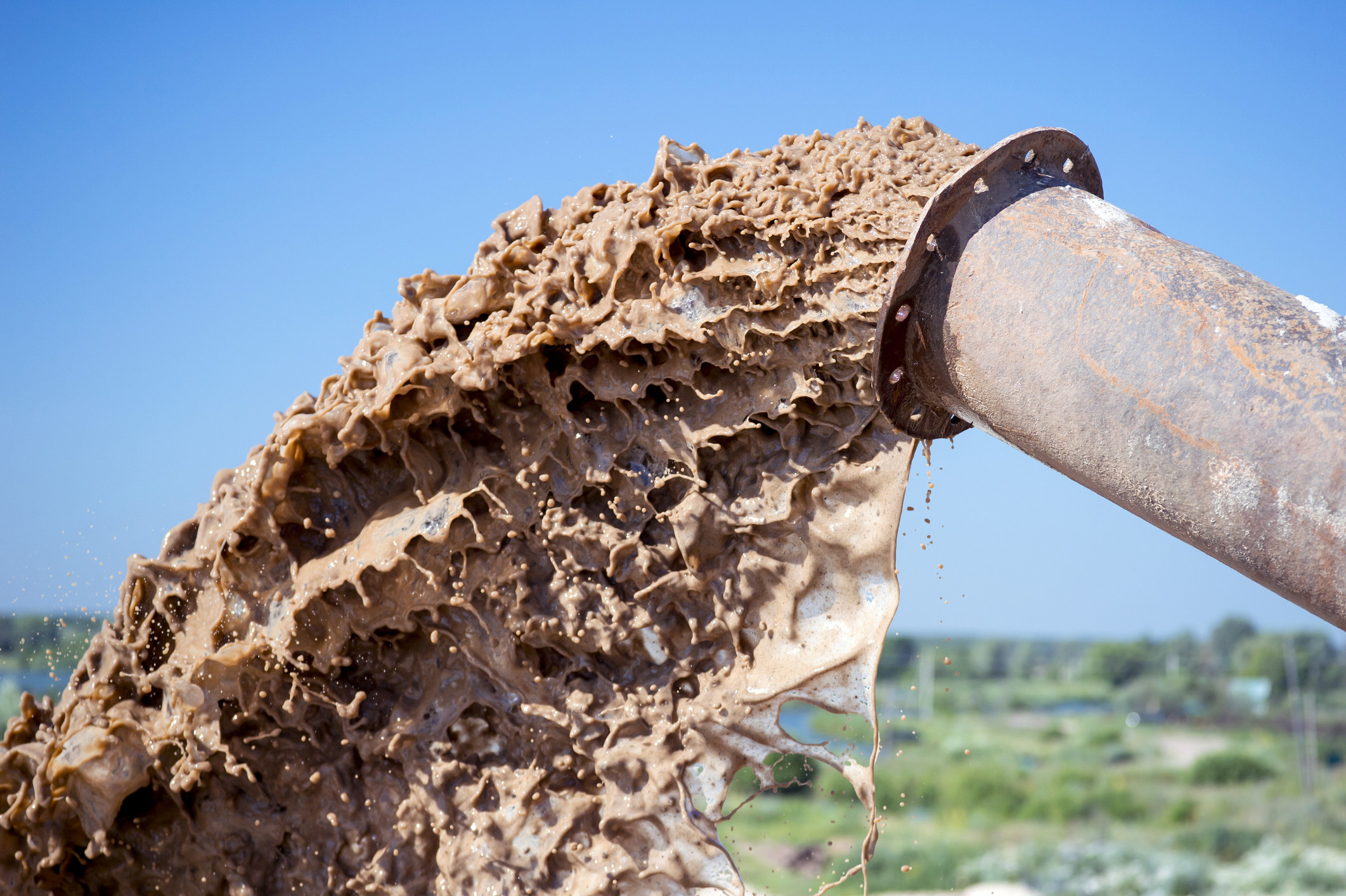 Mine waste coming out of a drainage pipe