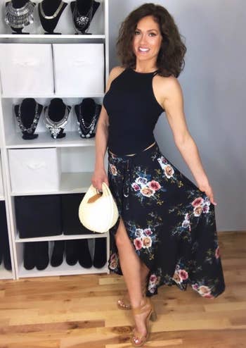 Reviewer wearing the black floral skirt