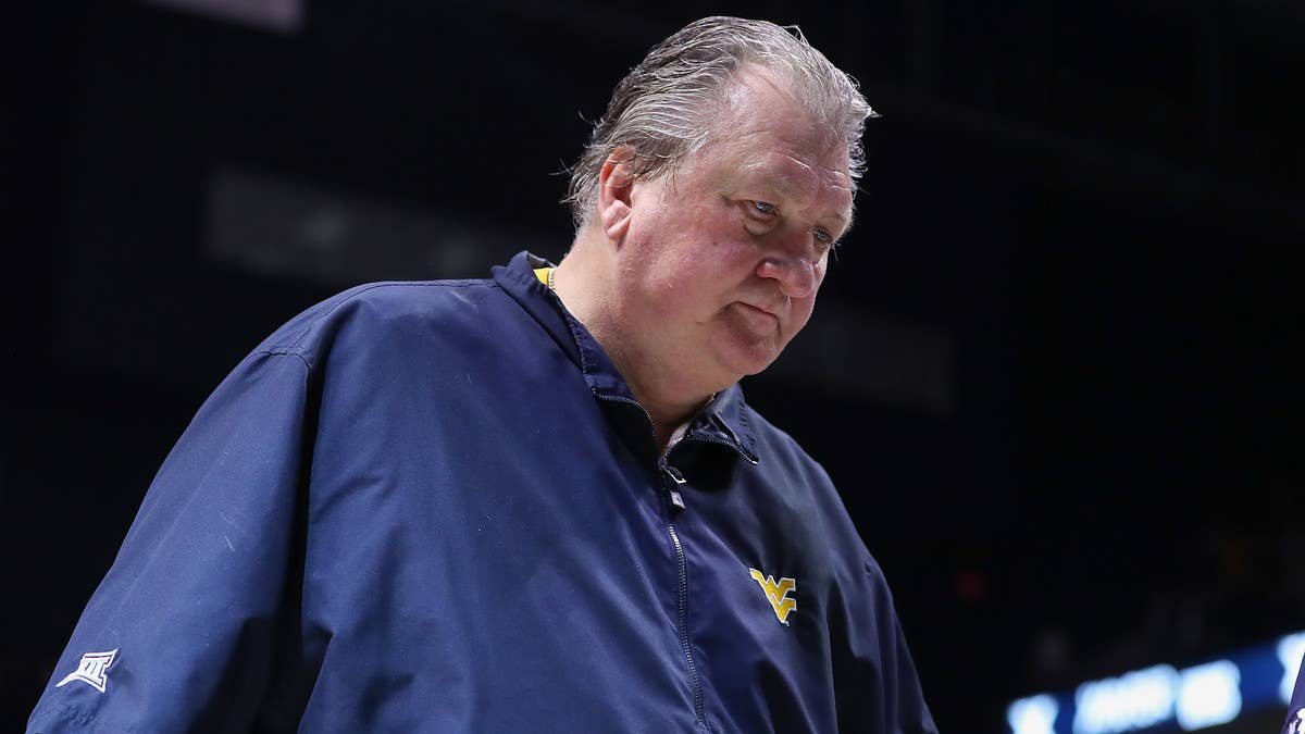 West Virginia's Bob Huggins sparked backlash after uttering a homophobic slur multiple times during an appearance on a local radio show on Monday.