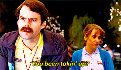 A man addresses someone off-camera, asking &quot;You been tokin' up?&quot; while a woman looks on from behind him