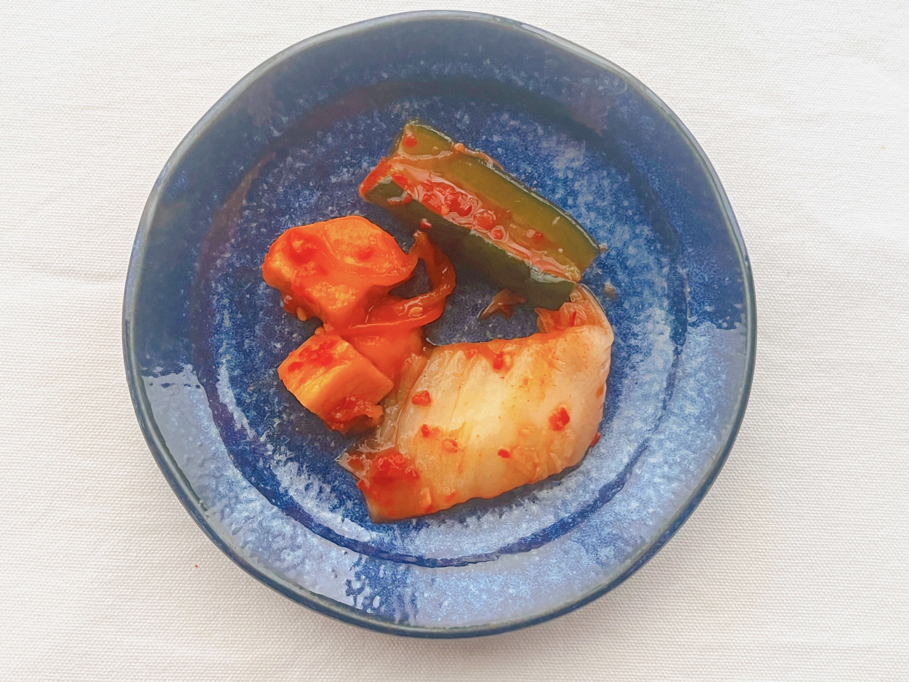 セブン-イレブンのオススメのおつまみ「シャキッと長芋入り 味わい3種キムチ」