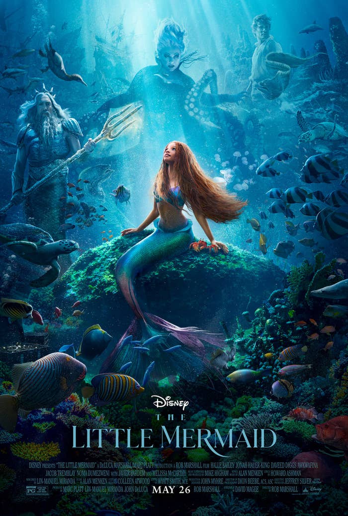 The Little Mermaid poster featuring Ariel sitting on the ocean floor and looking up at the surface