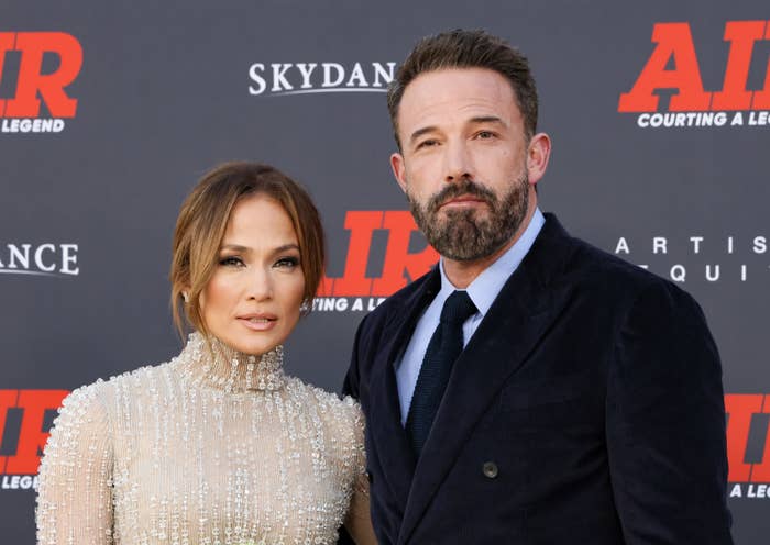 JLo and Ben standing together