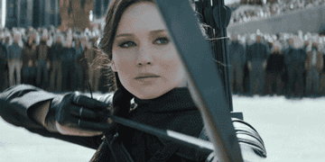 Katniss Everdeen from &quot;The Hunger Games&quot; movie drawing her bow