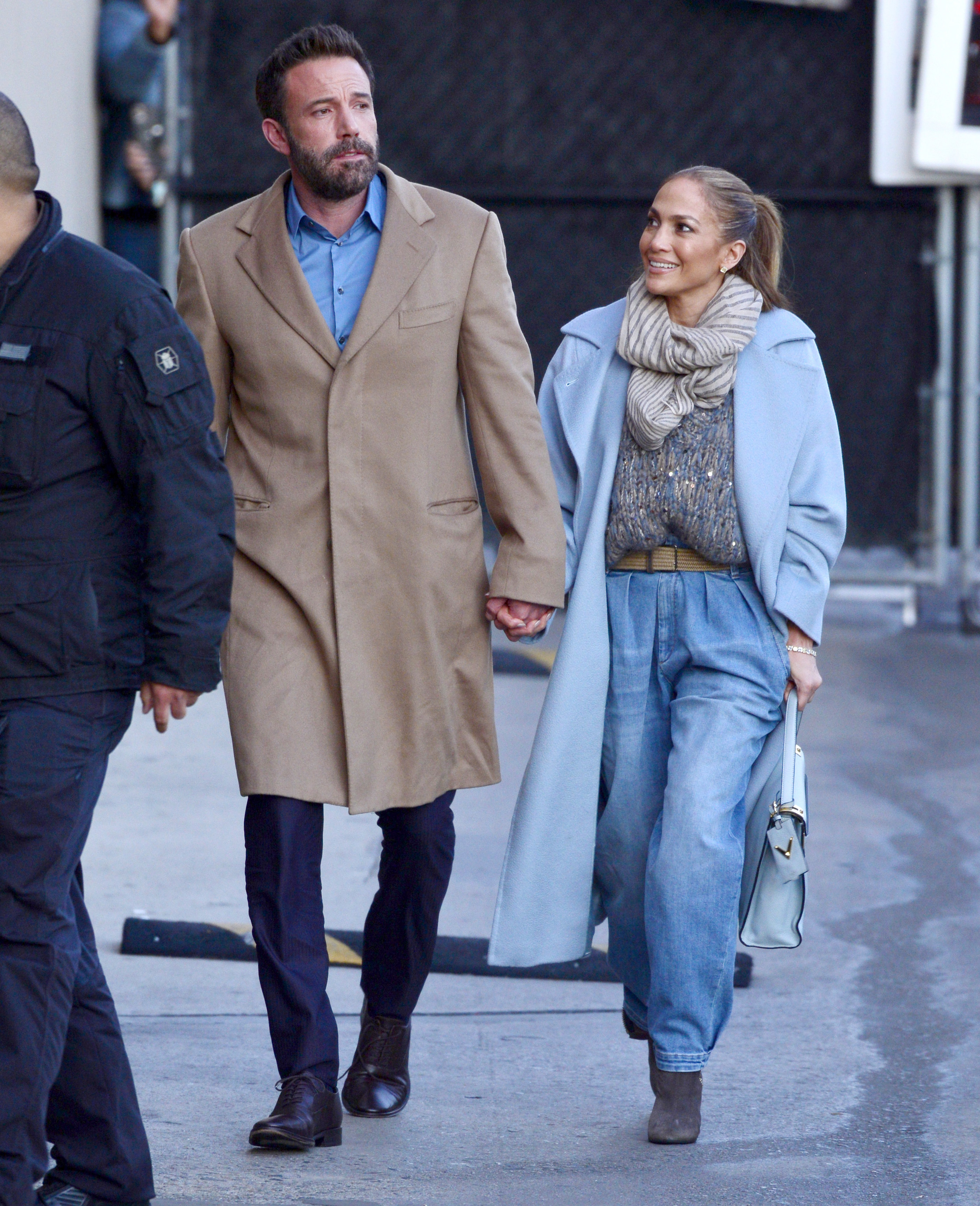 Ben and JLo on the street holding hands