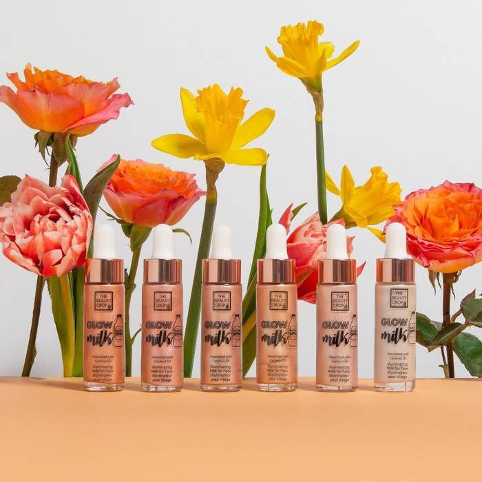 The product lined up behind a floral backdrop