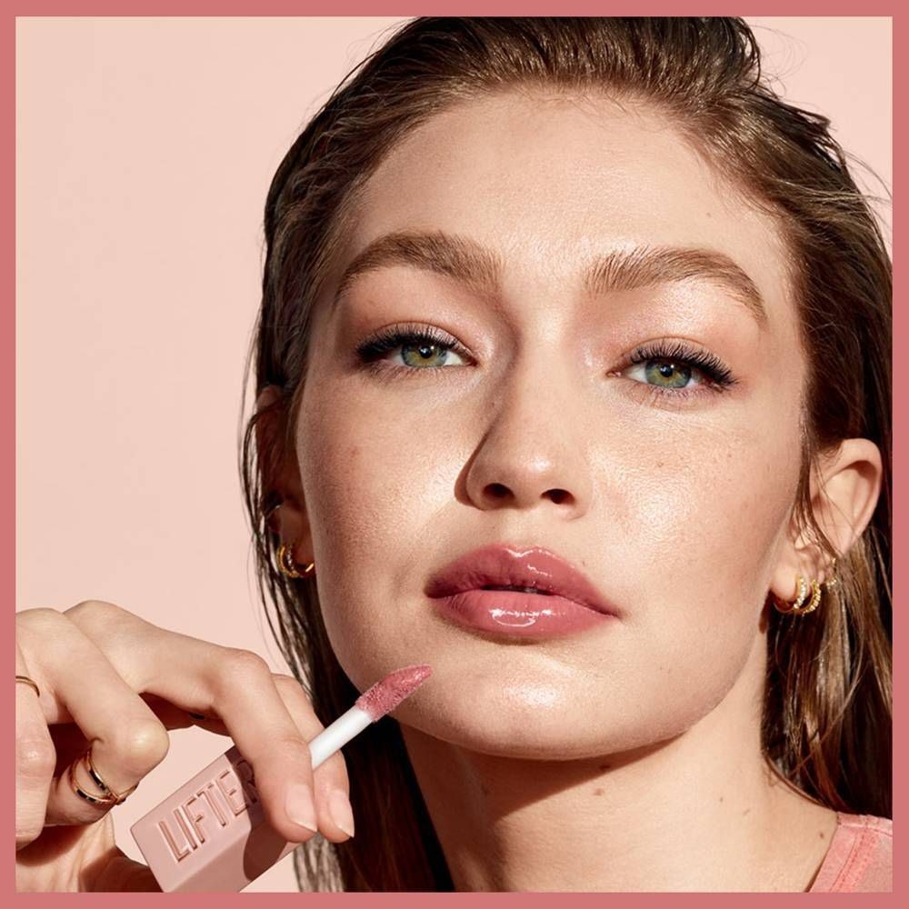 Model Gigi Hadid holding the product in her hands.