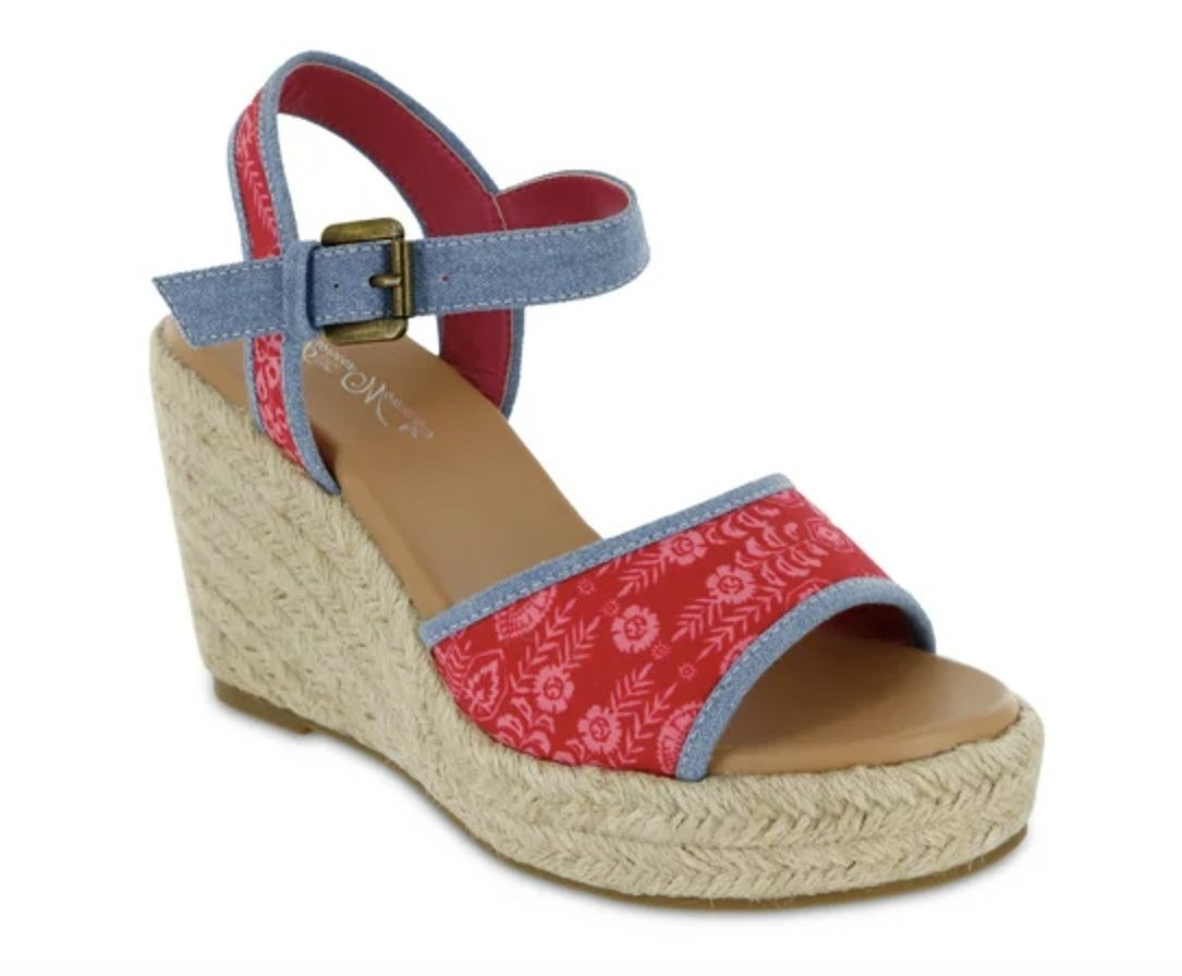 An espadrille sandal wedge with red floral details