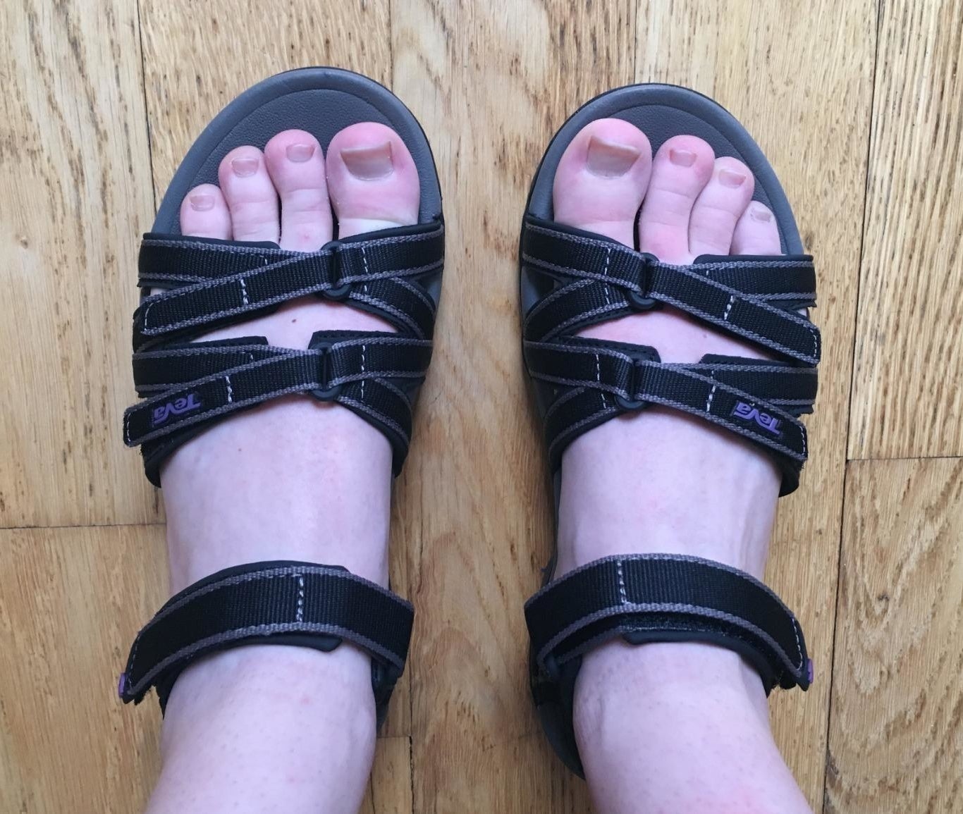 Image of reviewer wearing black sandals