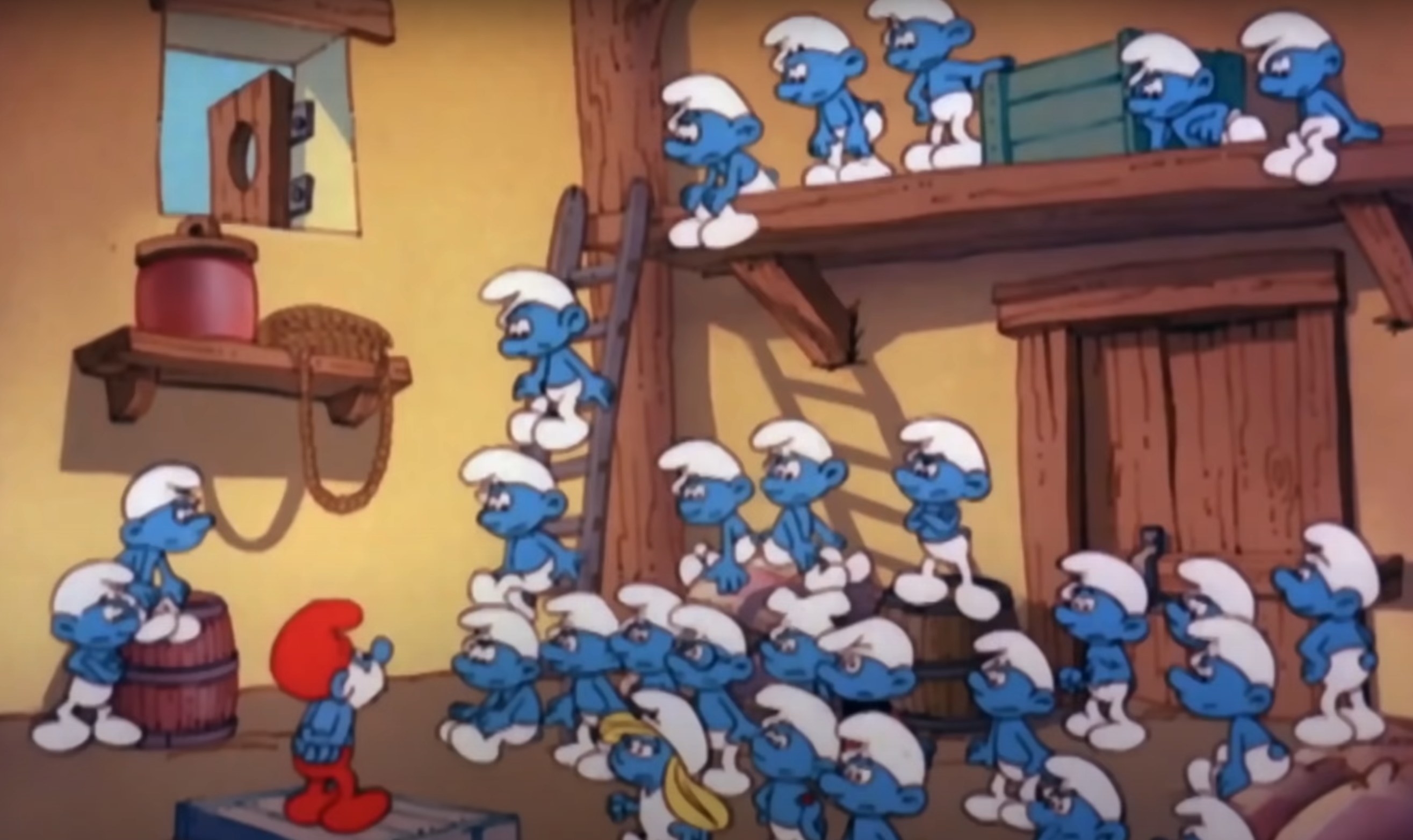 The Smurfs gather and listen to Papa Smurf