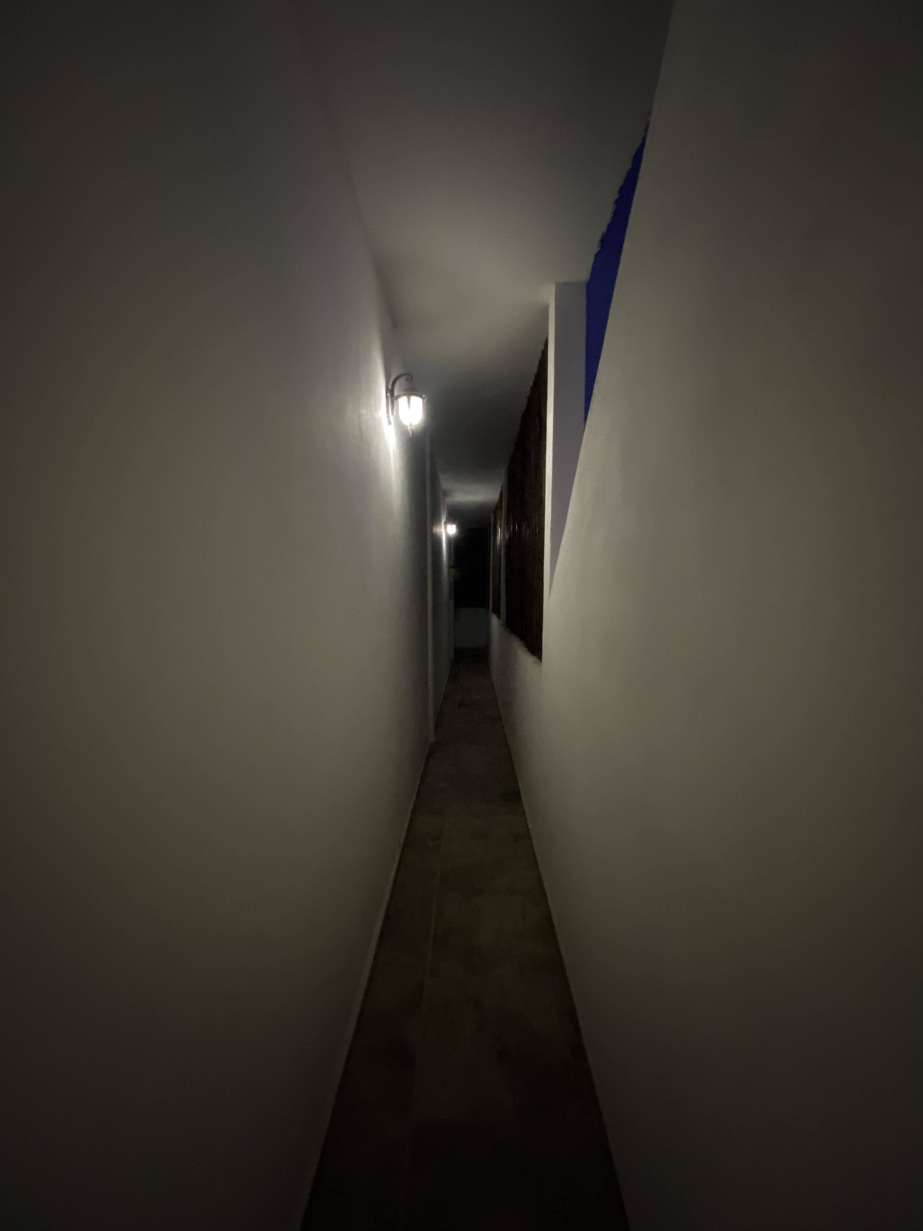 A dark, narrow hallway