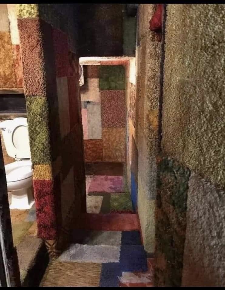 A room decorated completely with carpet
