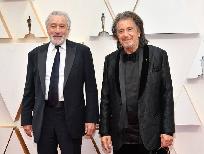 Robert De Niro, on the left, stands next to Al Pacino on the Oscars red carpet